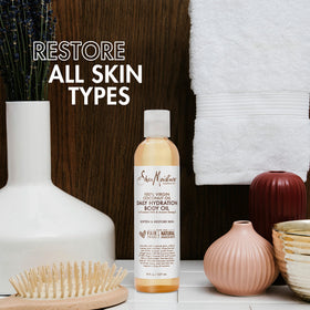 SheaMoisture pouring oil texture close-up demonstrating fast-absorbing lightweight finish