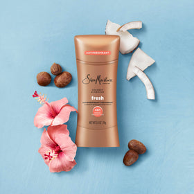 SheaMoisture coconut and hibiscus still life evoking fresh tropical fragrance