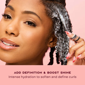 Shea Moisture 12 oz jar next to common items showing actual size