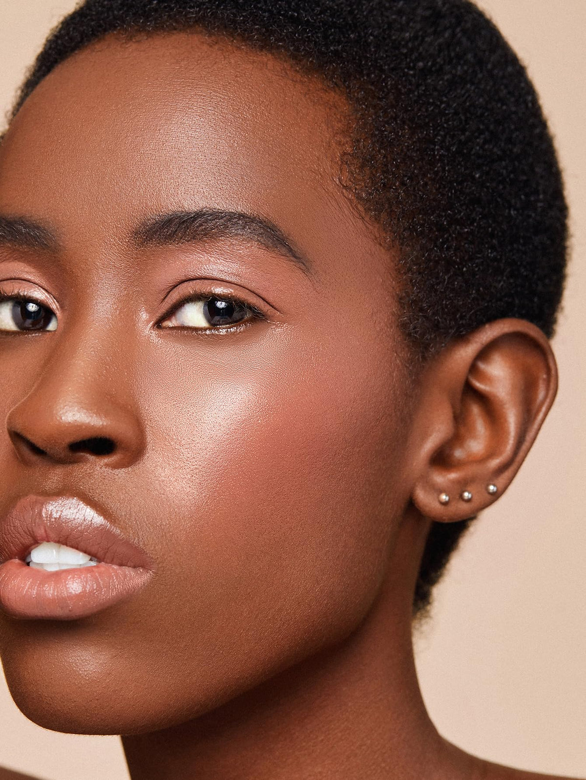 SHEGLAM worn on cheeks in natural lifestyle scene for soft hydrated look