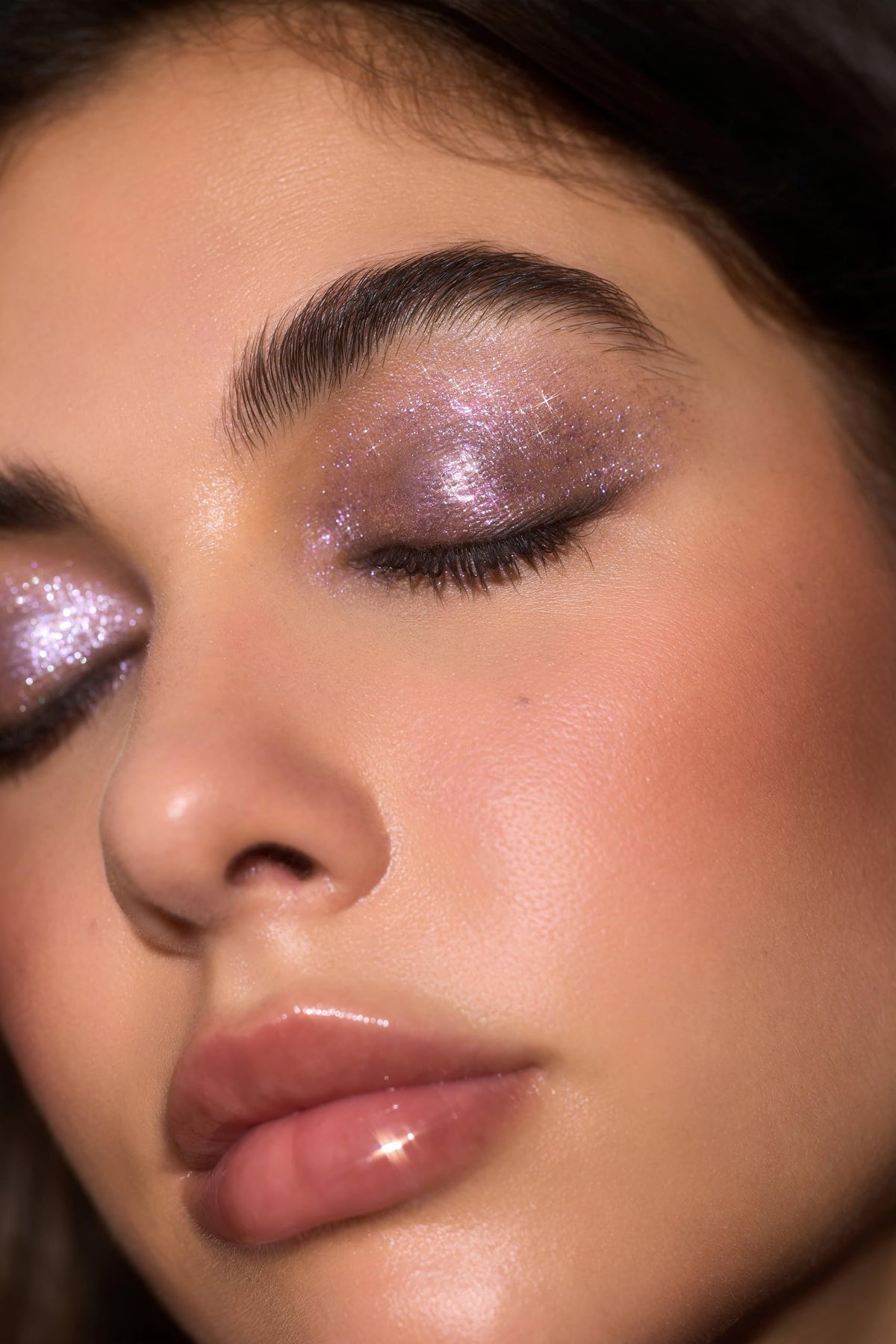SHEGLAM product used as eyeliner and smudged lid creating soft sparkling definition