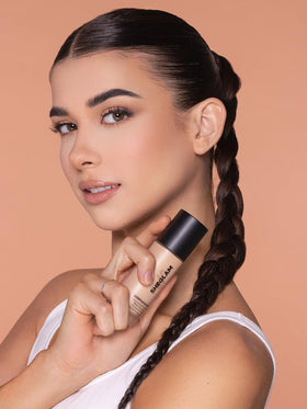 SHEGLAM close-up of a foundation drop showing creamy, lightweight formula benefit