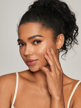 SHEGLAM primer on vanity in lifestyle scene showing daily routine convenience