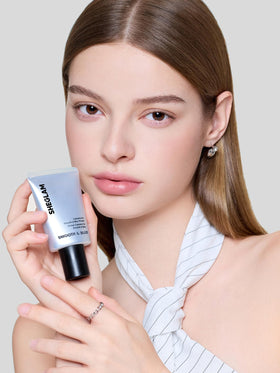 SHEGLAM primer in a makeup bag for on-the-go touch-ups