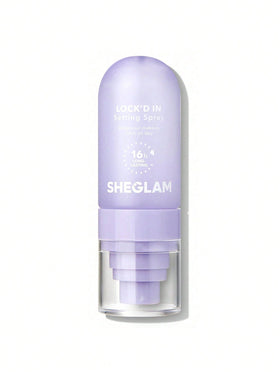 SHEGLAM front bottle view showing purple setting spray which conveys lasting hold