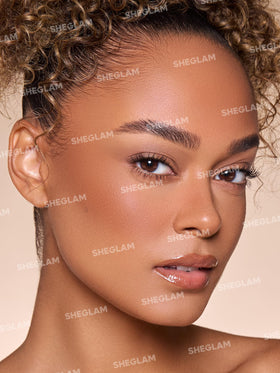 SHEGLAM Sun Sculpt applied on cheek demonstrating real-time contour definition