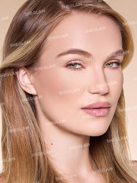 SHEGLAM applied under cheekbone with sponge, creates sculpted definition