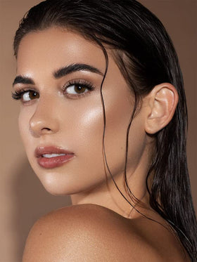 SHEGLAM texture swipe of Vanilla Frost highlighting cream showing smooth reflective shimmer