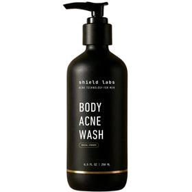 Shield front bottle showing unscented benzoyl peroxide formula, clear acne-fighting benefit