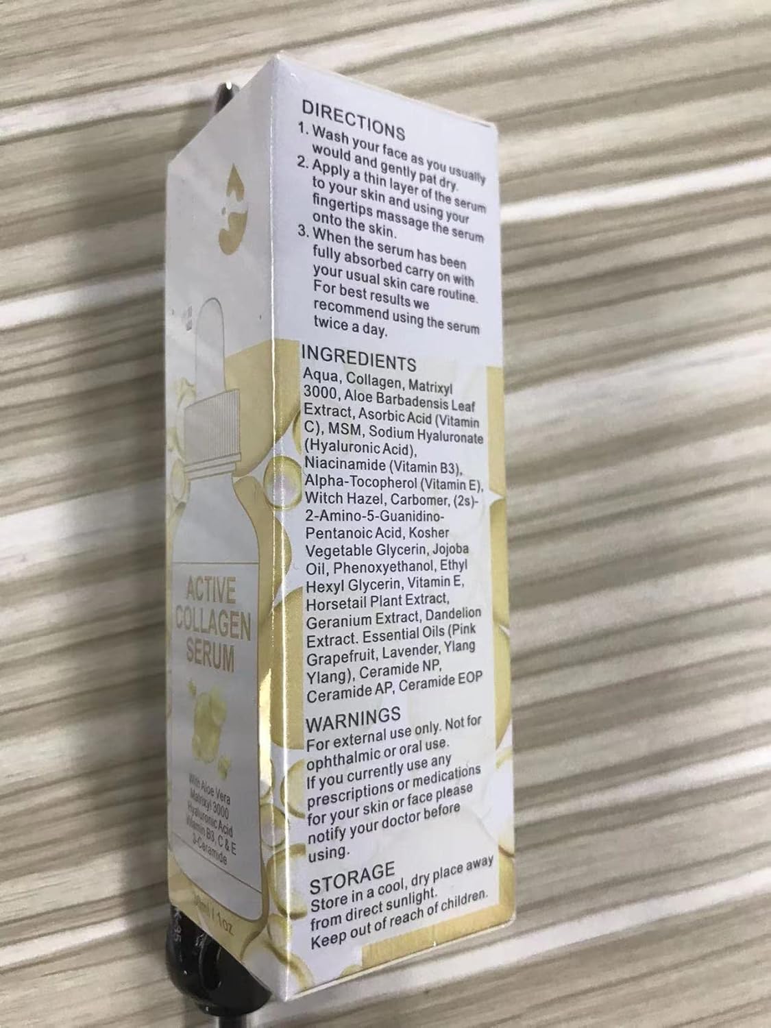 SHIFAKOU dropper dispensing serum close-up, highlights silky texture and fast absorption