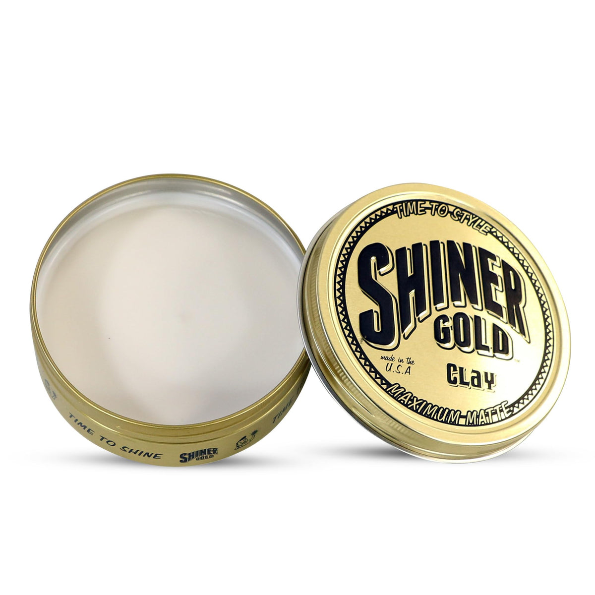 shiner gold pomade on fingers ready to apply for easy styling benefit