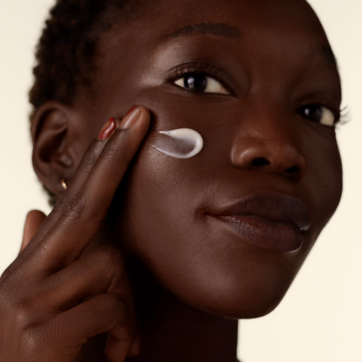 Shiseido Benefiance being applied on hand demonstrating fast absorption and non-greasy feel