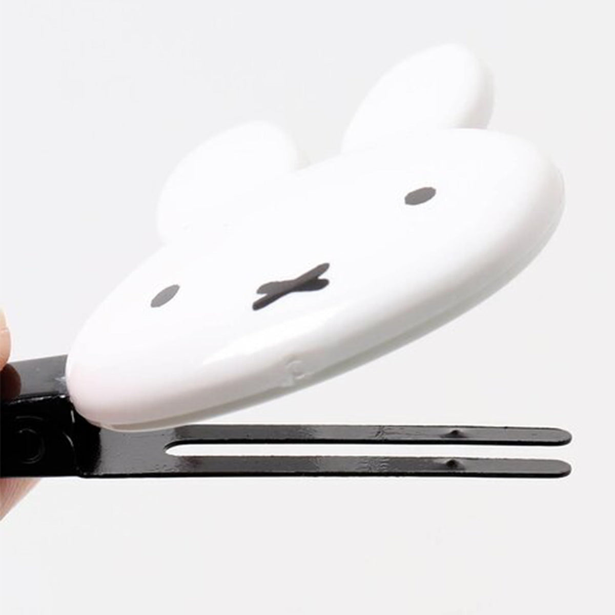 SHOBIDO Miffy clipped under a hat showing compatibility with headwear benefit