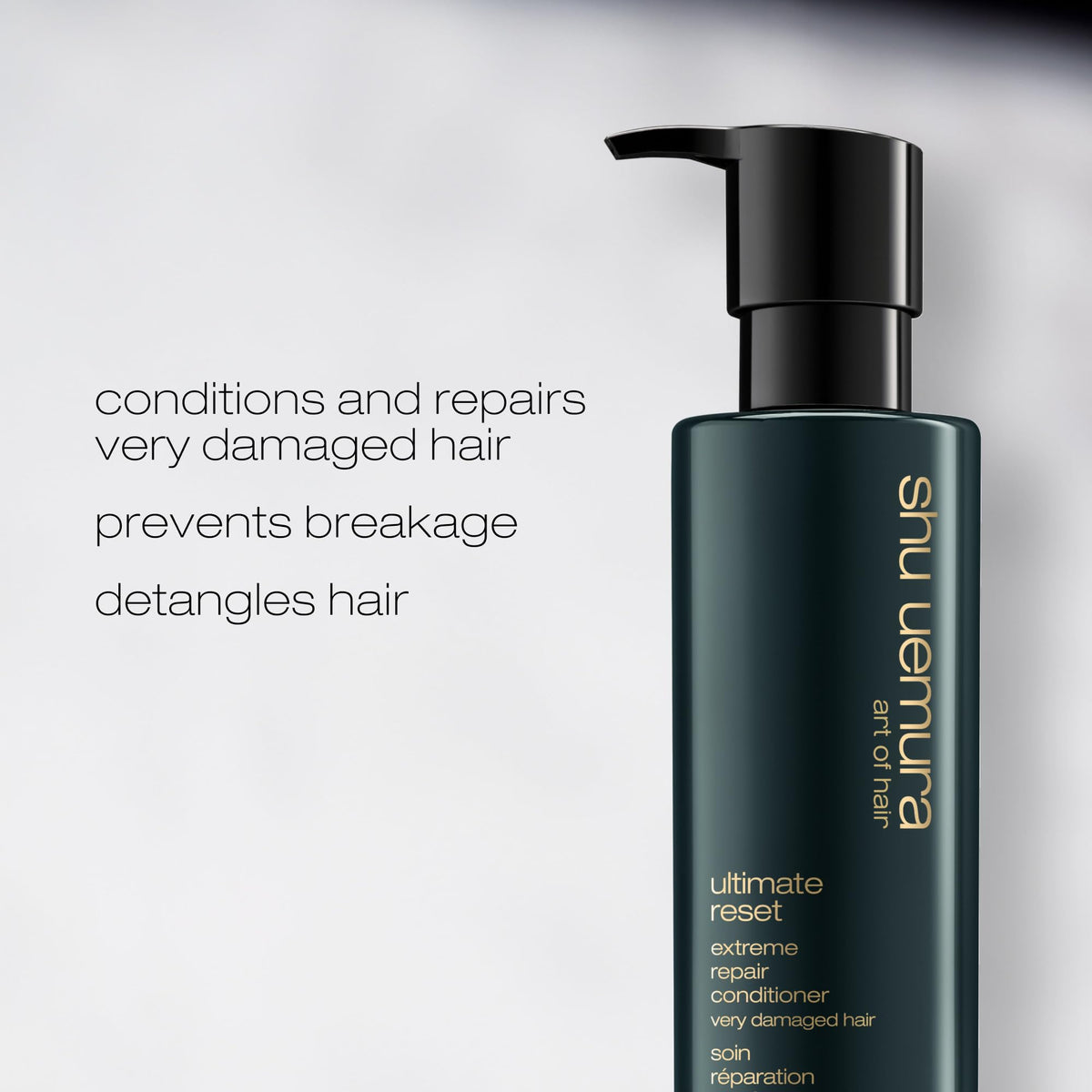 shu uemura art of hair applying conditioner to mid-lengths and ends demonstrating detangling