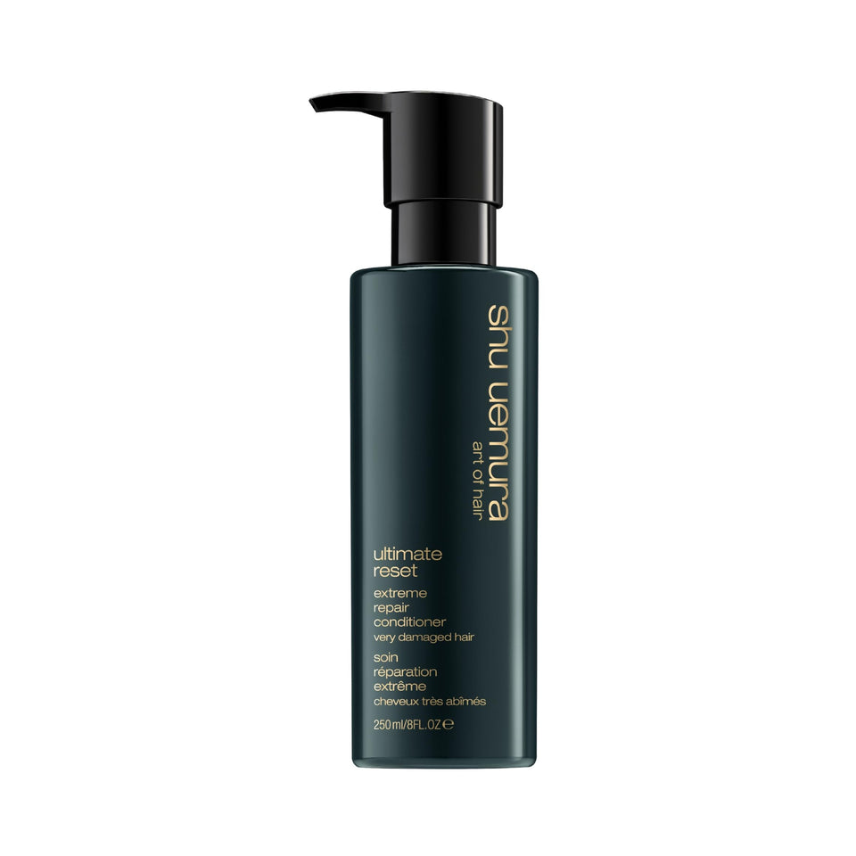 shu uemura art of hair front bottle on white surface showing packaging and benefit
