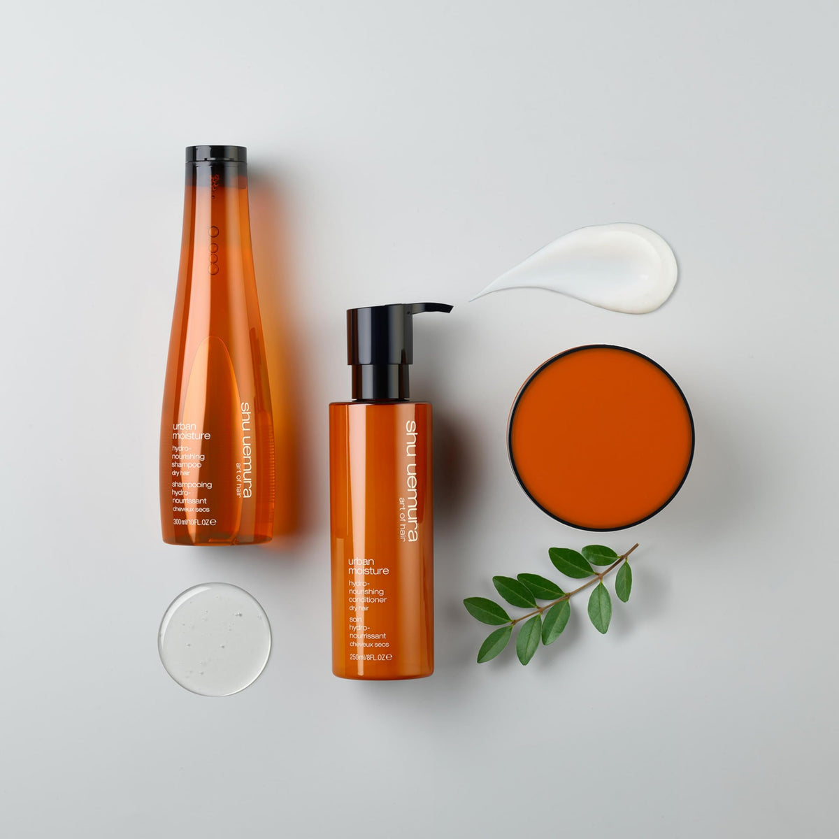 shu uemura bathroom lifestyle scene depicting effortless styling and nourished hair