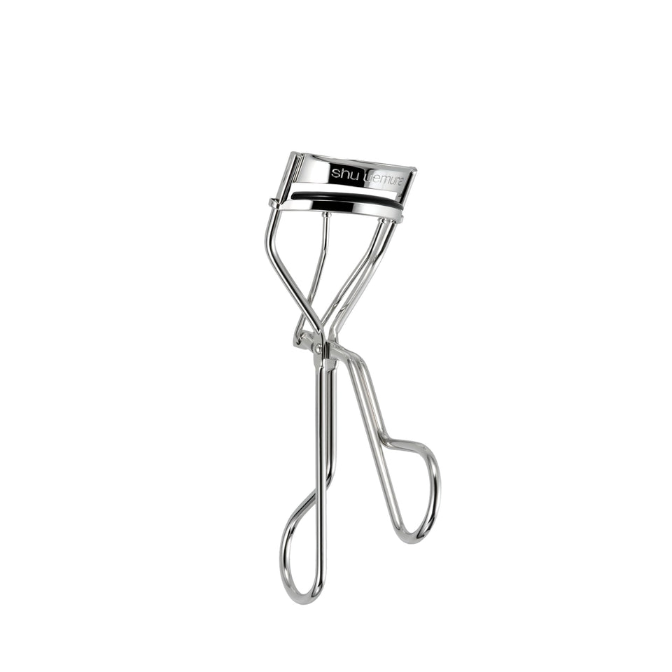 shu uemura front view of curler showing sleek shape and control benefit