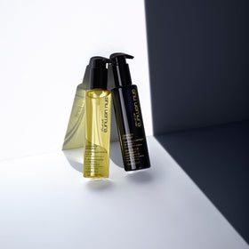 shu uemura displayed on bathroom vanity for everyday luxury and easy reach