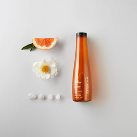 shu uemura shampoo lather in hand demonstrating gentle cleansing and softness