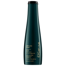 shu uemura art of hair bottle front packaging showing premium design and repair benefits