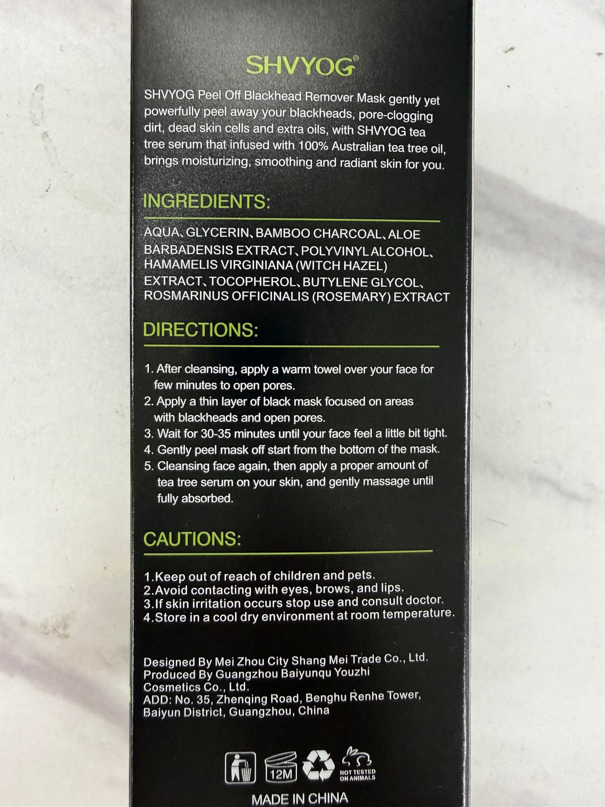 SHVYOG ingredients label near bamboo charcoal piece highlighting purifying element