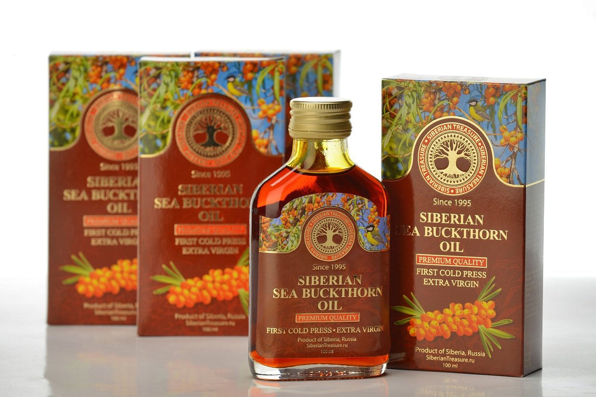 Siberian Treasure oil poured from bottle onto spoon showing dosing and culinary use benefit: flavorful finish