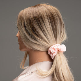 Silmer scrunchie worn in a ponytail demonstrating gentle hold