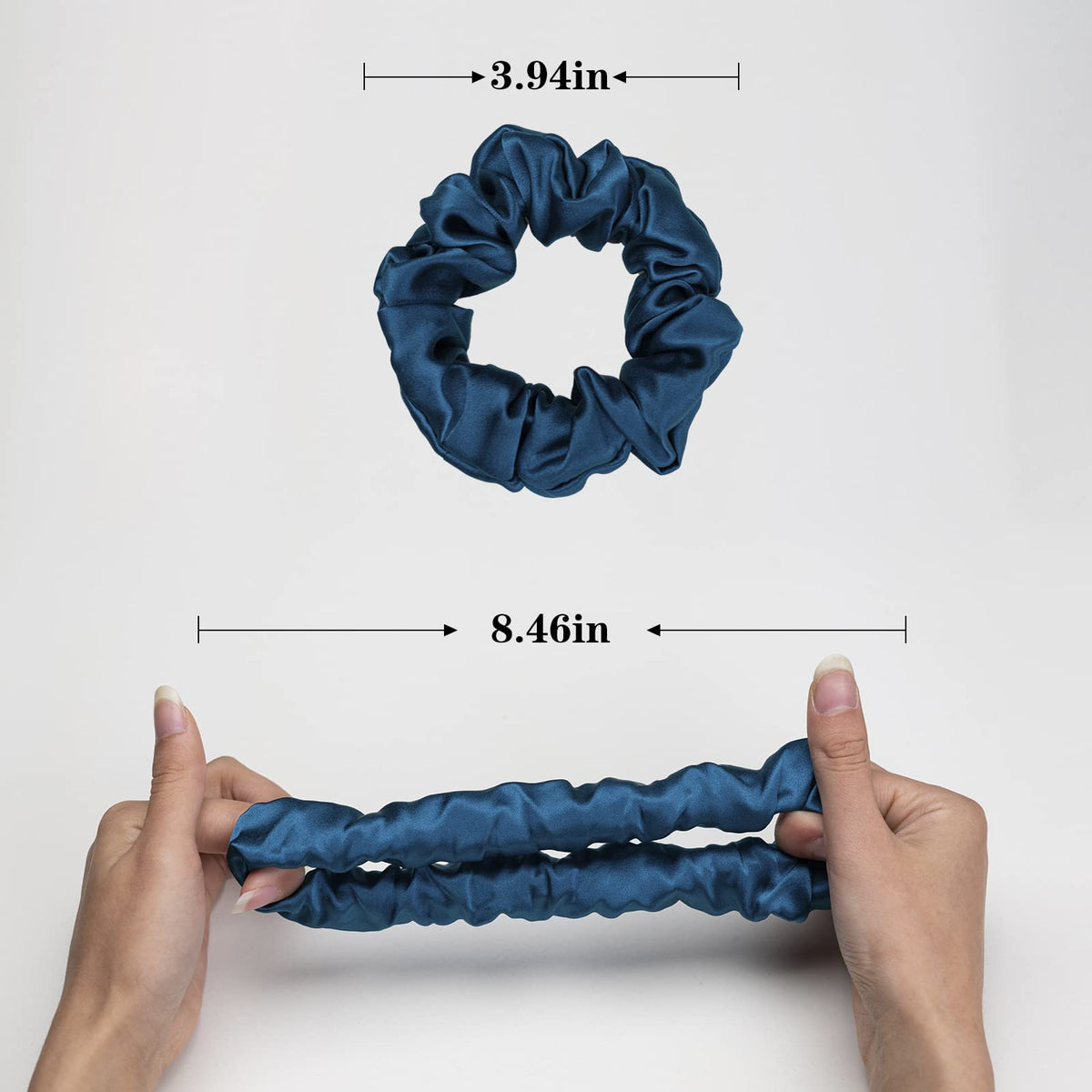 Silmer scrunchie in hand to show scale and travel-friendly benefit