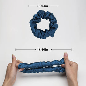 Silmer scrunchie in hand to show scale and travel-friendly benefit