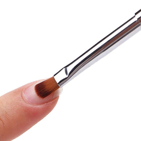 SILPECWEE brush placing glitter on nail demonstrating accurate decorative placement