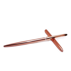 SILPECWEE brush held in hand showing size and comfortable control advantage