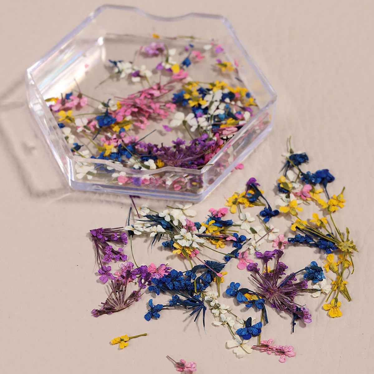 SILPECWEE resin charm with embedded petal illustrating craft versatility