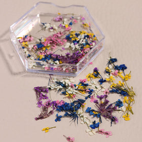SILPECWEE resin charm with embedded petal illustrating craft versatility