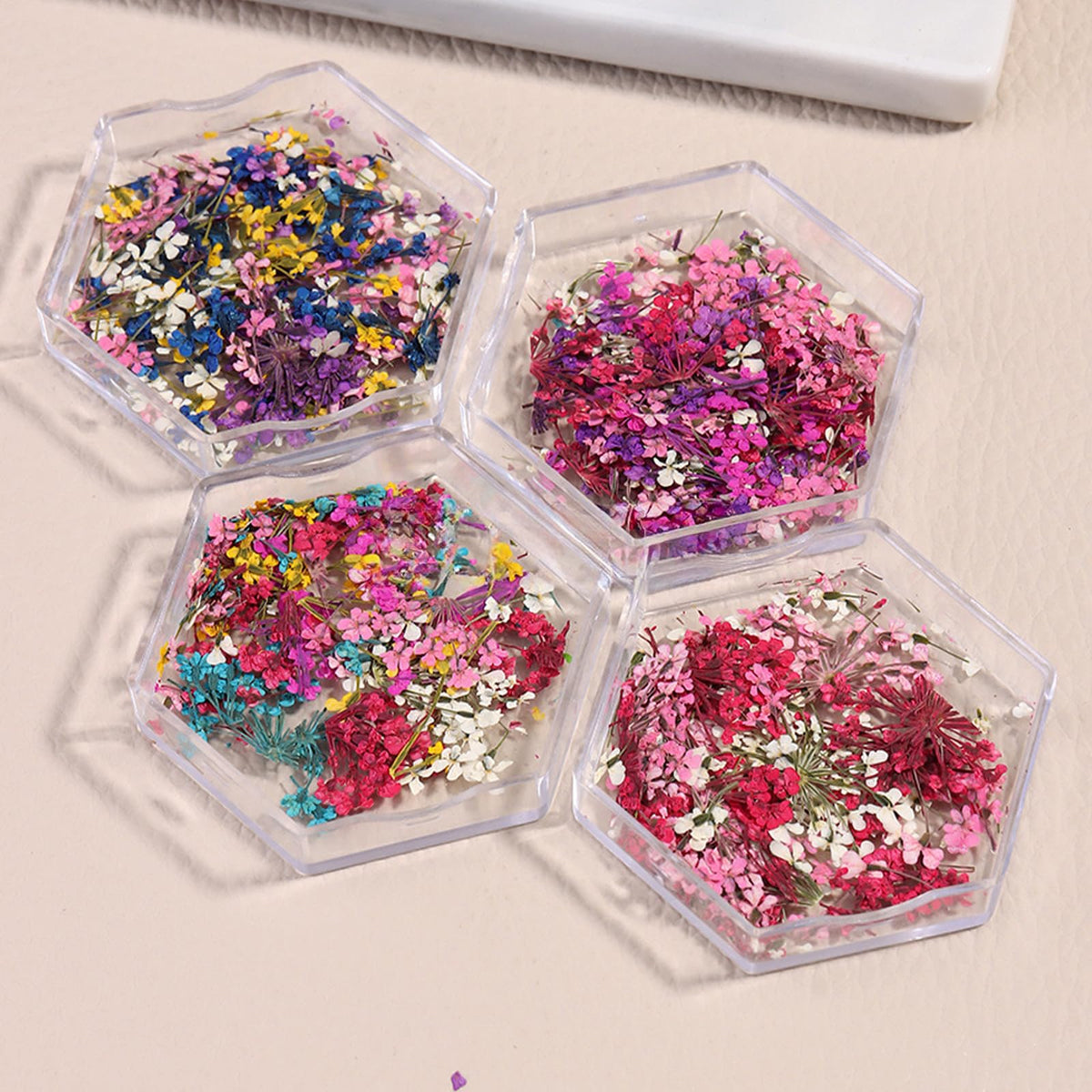 SILPECWEE petals next to fingers for size comparison and easy planning