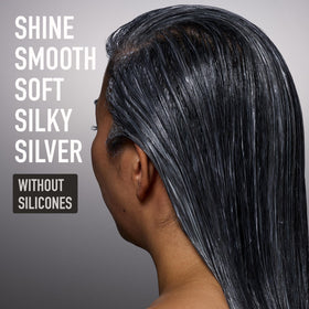 Silverist conditioner applied to wet hair in shower, demonstrating detangling and smoothing benefit