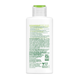 Simple moisturizer next to common objects showing 4.2 oz size for scale and convenience