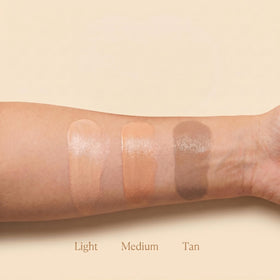 Simple Sophistication sunscreen in outdoor setting showing reef-safe ocean-friendly use