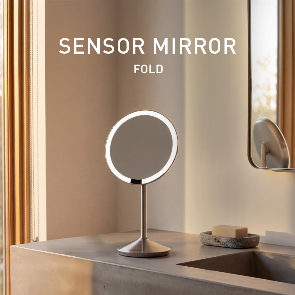 simplehuman mirror open on vanity at angle showing bright Tru-Lux lighting for makeup