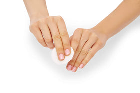 Simply Soft soaked pad removing nail polish showing efficient removal benefit