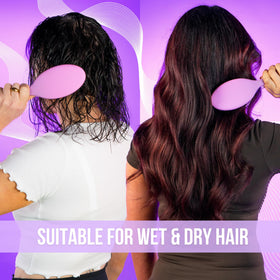 SimplyHair brush being used on clip-in extensions to detangle without pulling