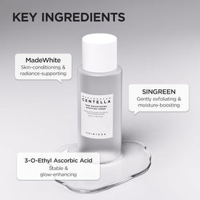 SKIN1004 pouring toner into cotton pad for gentle exfoliation benefit