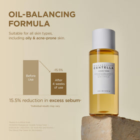 SKIN1004 pouring toner into hand demonstrating easy application and moisture