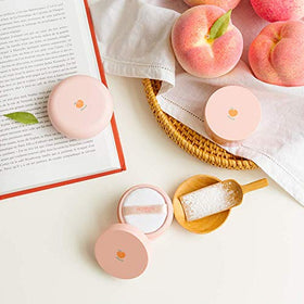 SKINFOOD 1957 lifestyle bag shot illustrating peach-scented powder as on-the-go essential