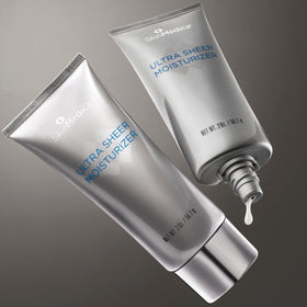 SkinMedica jar on a bathroom shelf staged with skincare to show everyday routine compatibility