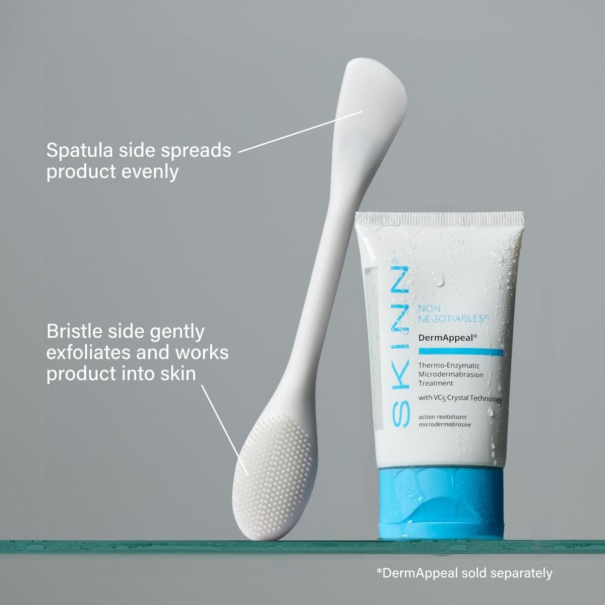 SKINN wand in hand using bristle side with cleanser for deeper yet gentle cleansing