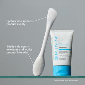 SKINN wand in hand using bristle side with cleanser for deeper yet gentle cleansing