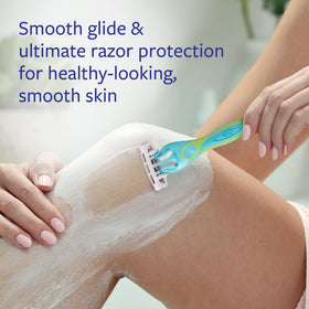 Hand holding Skintimate can to show size and easy dispensing benefit