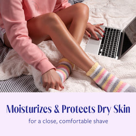 Skintimate gel dispensed on hand showing creamy lotionized texture for moisturized skin