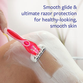 Skintimate raspberry rain texture foam on hand showing rich cushioning benefit