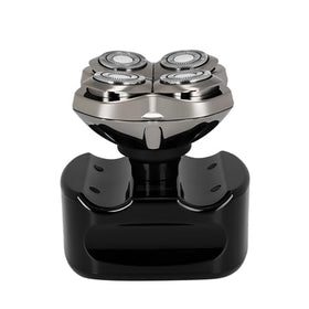 Skull Shaver Palm MX5 lifestyle image of man shaving his head for smooth, confident results